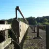 The parapets end abruptly on the top, giving an opportunity for a cross-section view. The rail on top is a later addition, perhaps when the bridge deck grew higher with progressive resurfacing work. The wall itself looks rather insubstantial.