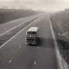 The same view after the motorway had opened. A Midland Red bus (destination board reading "London") appears to be hogging the middle lane, though it is probably avoiding the two workmen strolling around in lane 1! 5 March 1960.