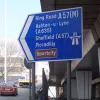The eastbound sliproad from this double-roundabout system rises up to the top deck here, and the signage reflects the long-distance aspirations of the Mancunian Way's planners. You could reasonably expect, from this sign, to be able to reach these places by motorway, but you'd be sorely disappointed if you tried it.