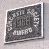 This is where the elevated section ends, and on the south side of the viaduct at Brook Street, the road's Concrete Society Award is proudly displayed. It is rather cleverly made out of several different types of concrete.