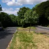 The thickly wooded central reservation is broken here and there by alarmingly low-standard junctions. Brake sharply to turn!