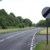 After another turning through the central reserve, the restrictions end and both southbound lanes are open to traffic. There is a very tactless wiggle here as the two carriageways move closer together. (These signs have since been removed and the whole bypass is now restricted to 50mph.)