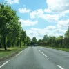 After the incredibly sharp and dangerous bends to the north of Mickleham, the dual carriageway is suddenly ruler straight into the far distance. There are no side turnings on this section, and no gaps in the central reservation, so the carriageways now run close together with a hedge in the middle.