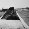 November 1959 at the opening ceremony for the first section of the M1. A cloth has been thrown over this embarassing faux pas. The southbound diverge sign at junction 10 has been placed in the hard shoulder. Oops!