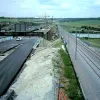 The CTRL follows French practice in being built to follow motorways. Further towards Folkestone it shadows the M20, then cuts north-west to follow the M2 over the Medway and on to London.