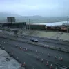 On a much colder and gloomier day some time later, what looks like a 'wiring' train is sat on the CTRL line as the overhead cables are fitted.