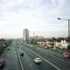 2002. Taken from the same point as the photo above, 39 years later, the Kingston Bypass has grown and so has the tower.  Photo by Roger Maxwell