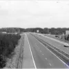 1982. A view towards London from junction 4. The section through the junction, in the foreground, is now a two-lane bottleneck on a much widened and improved motorway.  Photo by Robert