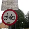 This wordy sign on Rose Court in Wokingham has been superceded by a slightly more obvious modern example, but luckily the old one has been left in place, continuing to threaten cyclists with a forty shilling fine.  Photo by Richard Thompson