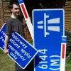 Back home, and a bucket of soapy water later, the museum pieces on display. I am very happy (pictured).  The smaller blue sign was positioned in one of the A6144(M)'s two lay-bys as a reminder not to park there.