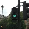 All the green man signals around Trafalgar Square have been changed, and the new versions are used almost randomly. These signals, on a crossing at the roundabout to the south side of the square, have two men holding hands, again with a heart between them. The two men are both versions of the normal green man symbol.