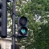 The symbols showing couples hand in hand are completed with a third version, showing a man and a woman together, again with a heart between them. The figure of the woman appears to be an adapted version of the girl from the "children crossing" warning sign.