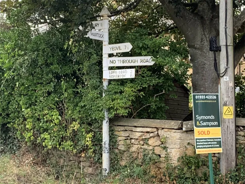 In the wonderfully named village of Coat, this signpost peeks out from the trees. The obscured sign on the left reads 'Kingsbury 1'. This is an abbreviation, as 'Kingsbury Episcopi' doesn't fit on every signpost.