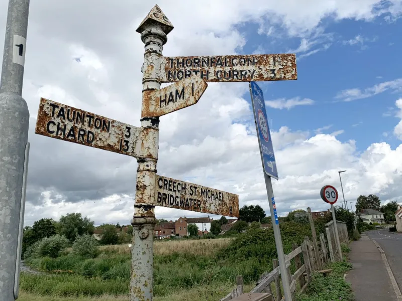 A slightly more folorn sign in Creech St. Michael, a village not far from the town of Taunton, and by a very pleasant stretch of riverside and canal.