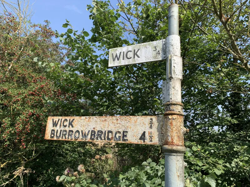Langport is a small town at the heart of the levels. To the west of the town, this partly restored fingerpost has had replacement plates put in, and it just doesn't look the same.