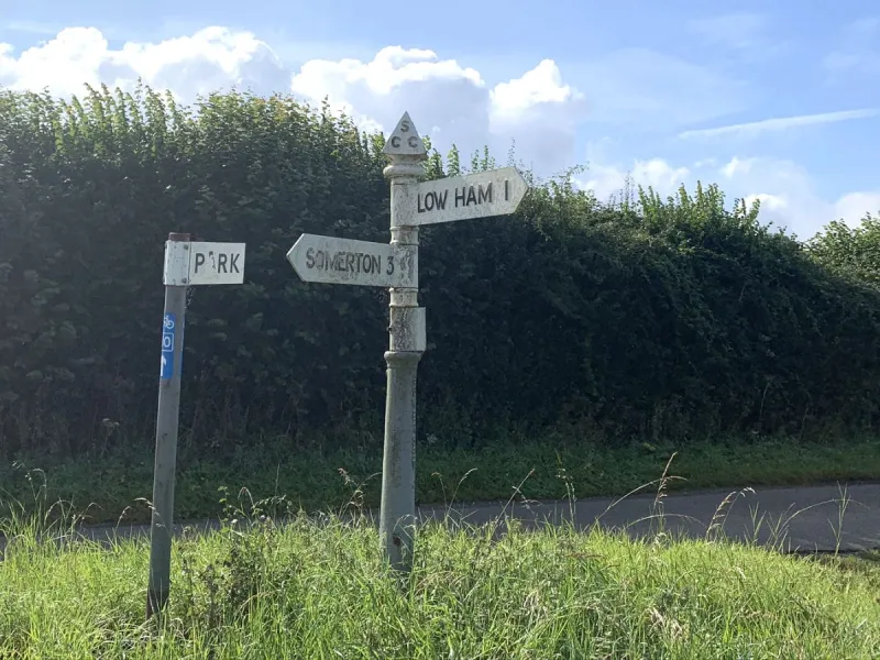 Just north of Pitney though, there is a mostly-original signpost. One arm is missing. No idea what the 'Park' is though!