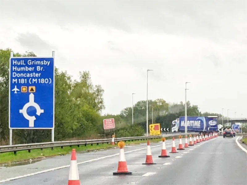 Heading south on the A1077(M), this is the sign for the new roundabout, which again doesn't look like a careful or permanent installation. The only direction is straight ahead to the M181.