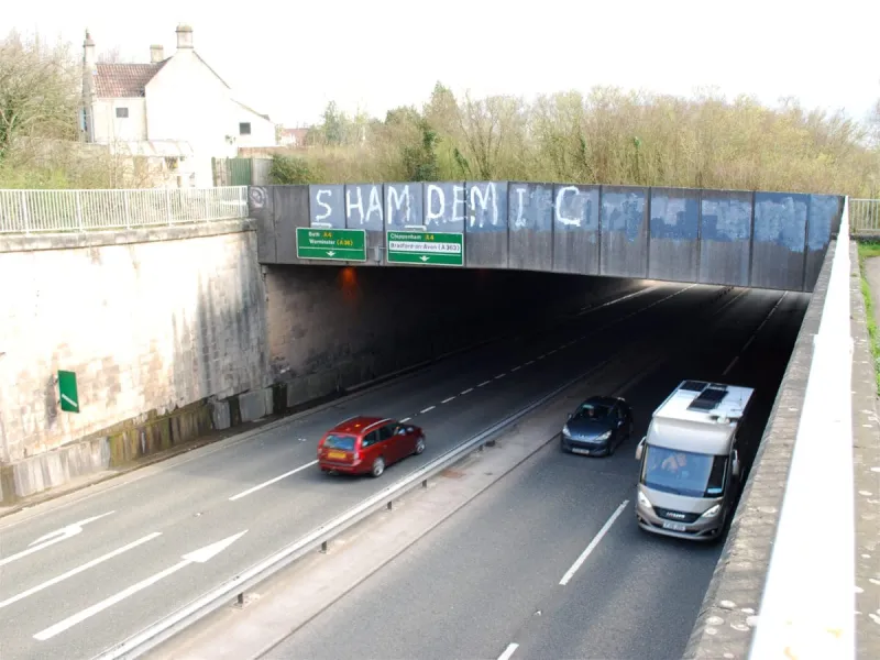 The entrance to the tunnel, hiding the road from the nearby houses. Click to enlarge