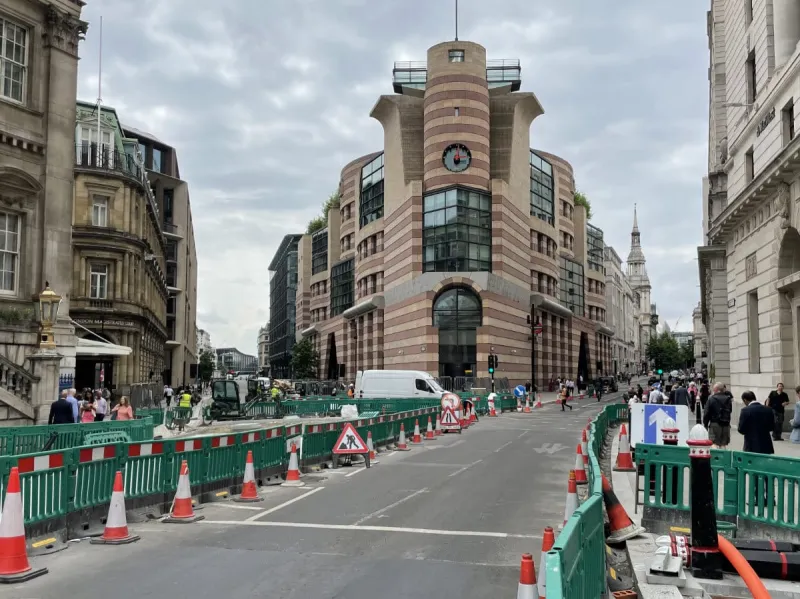 Finally there's the widest approach to Bank, which is the street improbably named Poultry. This was once the A40. In front is the striking postmodern building No. 1 Poultry, which sits between Queen Victoria Street on the left (once A3211) and Poultry on the right.